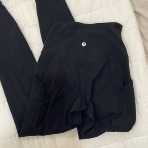 Lululemon black leggings with side pockets! SIZE 2! great condition!